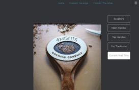 wildvinecarvings.com